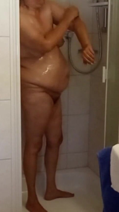 German BBW MILF 53 with natural tits & soft belly takes a shower | Clip 1