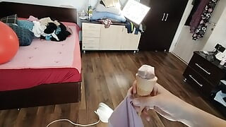 Amateur wife dancing naked at home. Amateur woman has fun trying on clothes and cutting them.