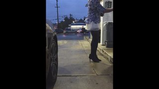 Gassing up in a white skirt