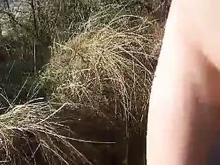 Walking nude at the beach and wanking