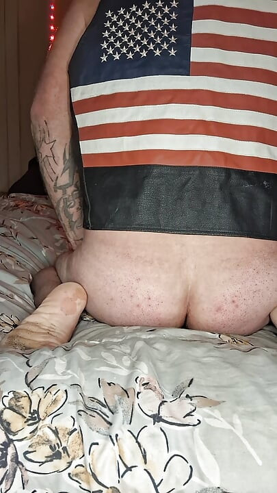 Straight biker hunk experiments with prostate massager