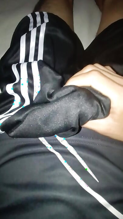 Masturbating in shorts