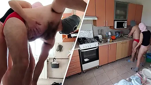 Crazy amateur couple having fun in the kitchen