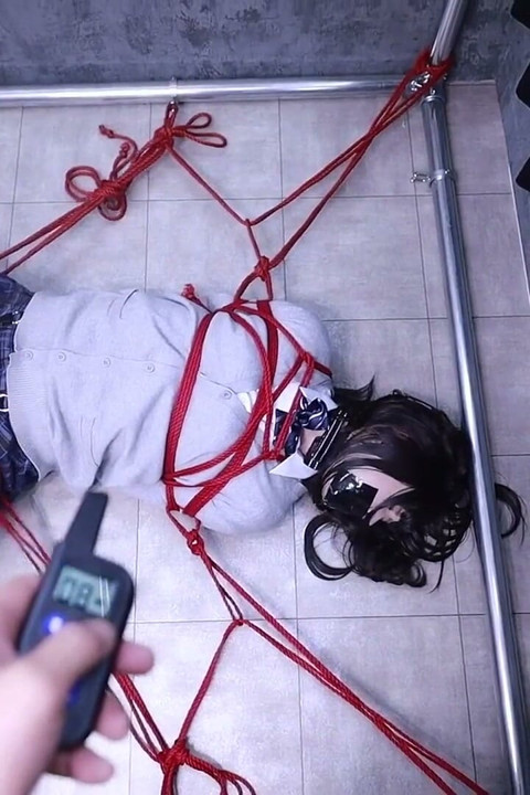 The Lovely Girlfriend Is Bound by Gloves, a Collar, and a Gag