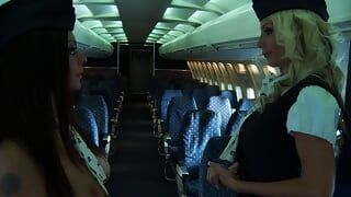 Horny air hostesses fuck in an empty plane