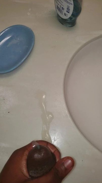 Fat Black guy jerks BBC and cums