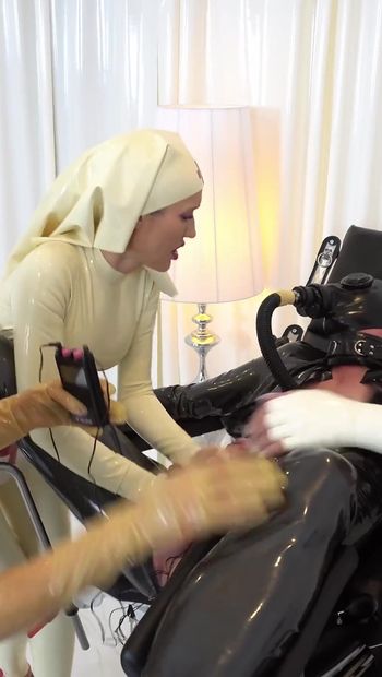 3 Mistresses Give the Rubber Slave a Medical Examination - Part 1