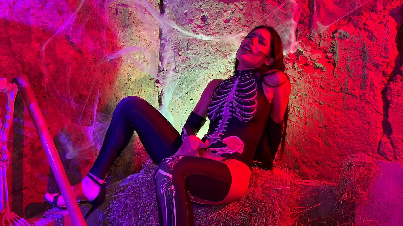 Petite Colombian woman gets aroused upon seeing a skeleton on Halloween night - Carolina Guerrero