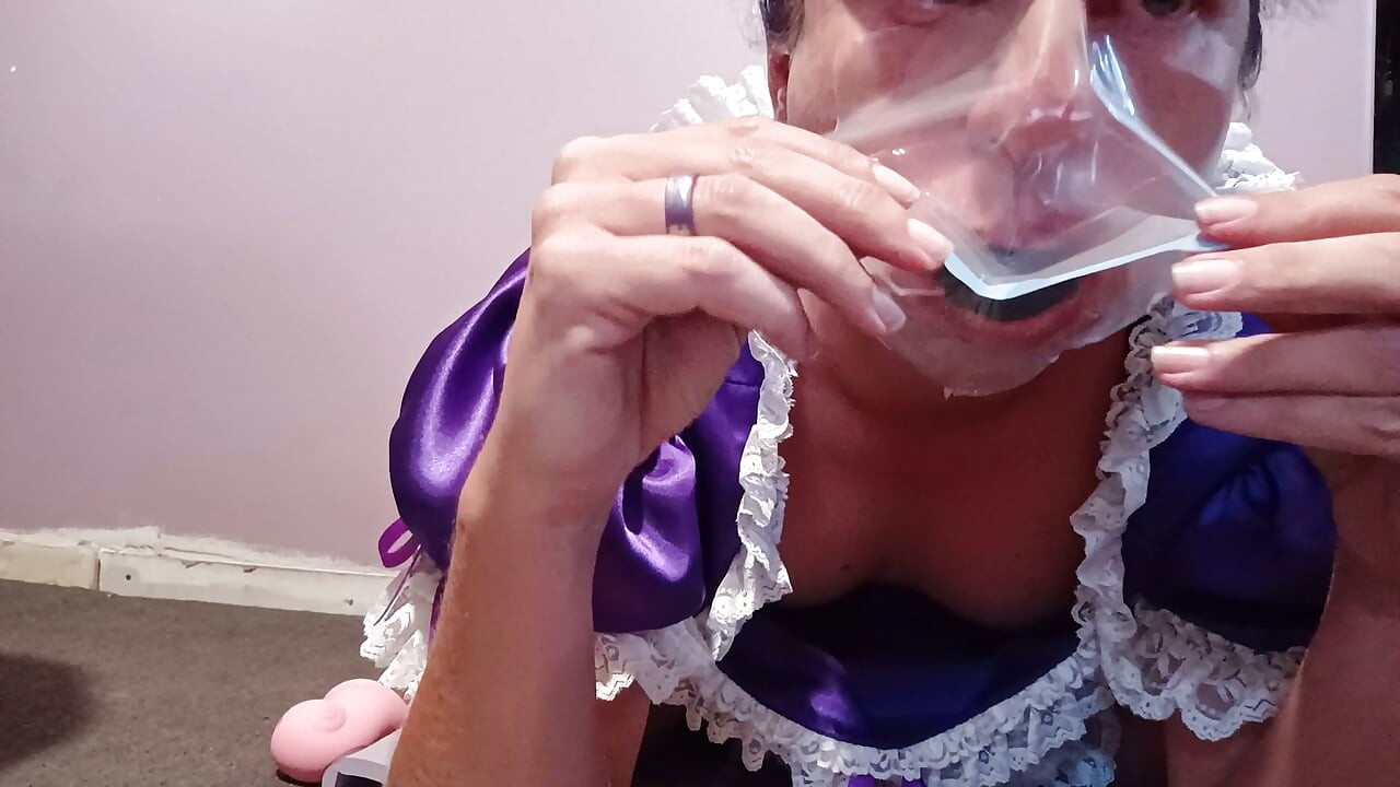 Maid Marcy plays with her cage