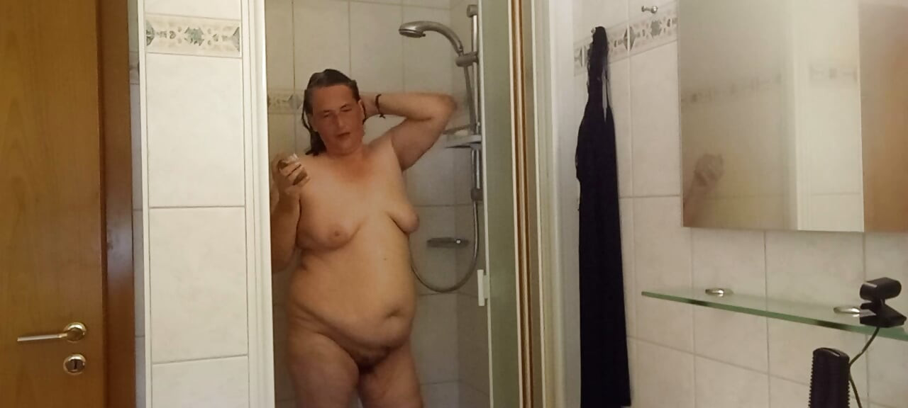 Chubby mature woman in the shower – soft belly – part 2