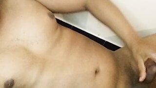 A teenager plays with his dick in the closet