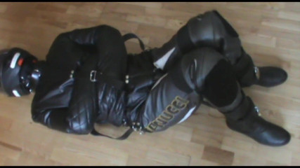 Bikerslave in the leather straitjacket