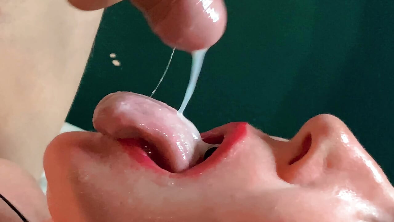 FORESKIN: She gags from huge amounts of sperm , going down her throat CLOSEUP