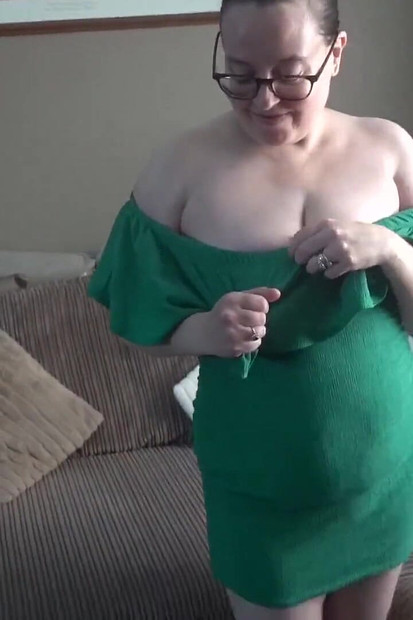 Stripping in Green Dress