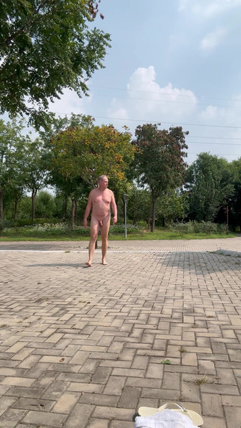 Jumping jack naked in public park