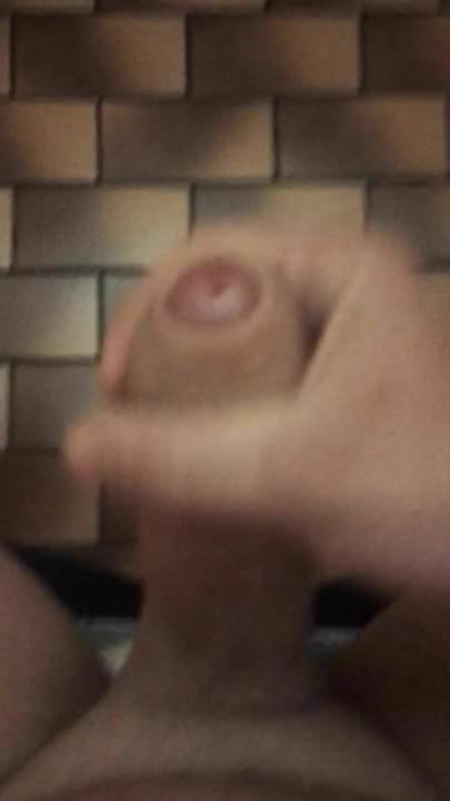 Masturbating