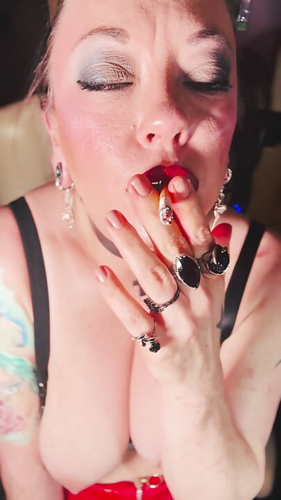 British Mature Smoker Tina Snua Plays With Her Big Natural Tits As She Smokes A Cigarette
