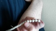 Sounding pearl necklace cum