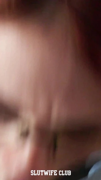 POV tease: Karla Rose with glasses on her knees, eye contact intense as she slurps my condom-covered dick.