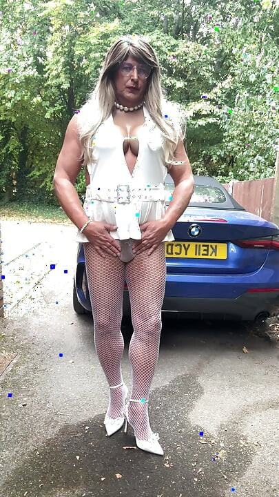 Sexy Crossdresser kellycd2022 in sexy white mini dress and fishnet pantyhose and heels