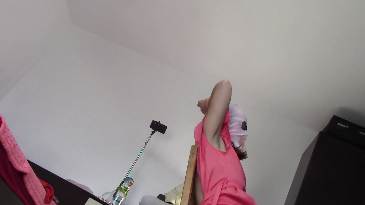 Amateur wife dancing naked at home. Amateur woman has fun trying on clothes and cutting them.