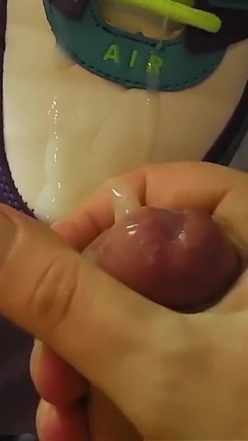 Stunning moment from "Fuck with Her Sneakers - Footjob in Nikes"