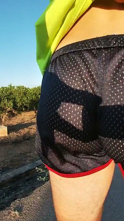 Tight shiny sport shorts bulging routine (freeballing in a public place) | Clip 2