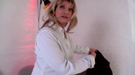 Lovely mature blonde masturbating with her sex toys
