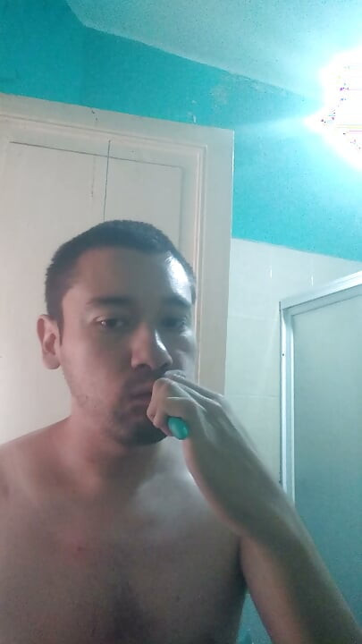 Washing my face while caressing my nipples