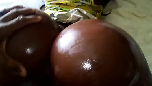 Lifting that Yellow Sundress up, so That I could Tap those Glorious, Greasy, Big ol' African Booty Cheeks! LOL