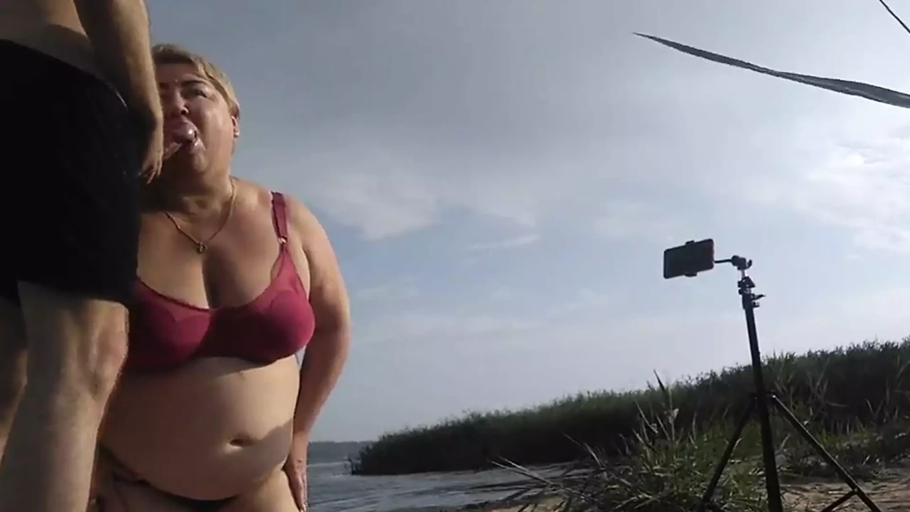 Mother-in-law sucks my dick on the beach and gets cum in her mouth