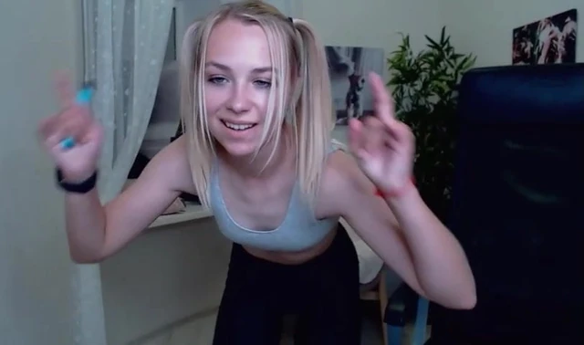 Blonde camgirl KimPositive dancing with pigtails