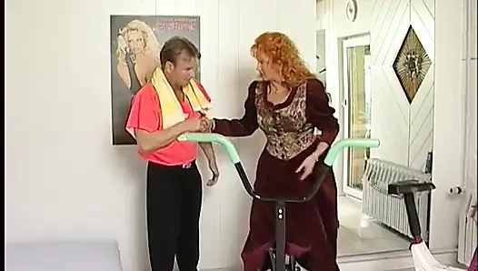 German granny with big boobs gets fucked by her horny gym trainer