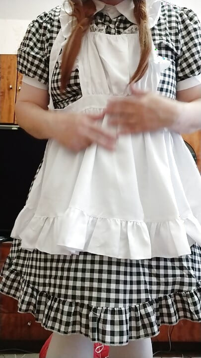 Maminsynek pokojówka pozuje i spust