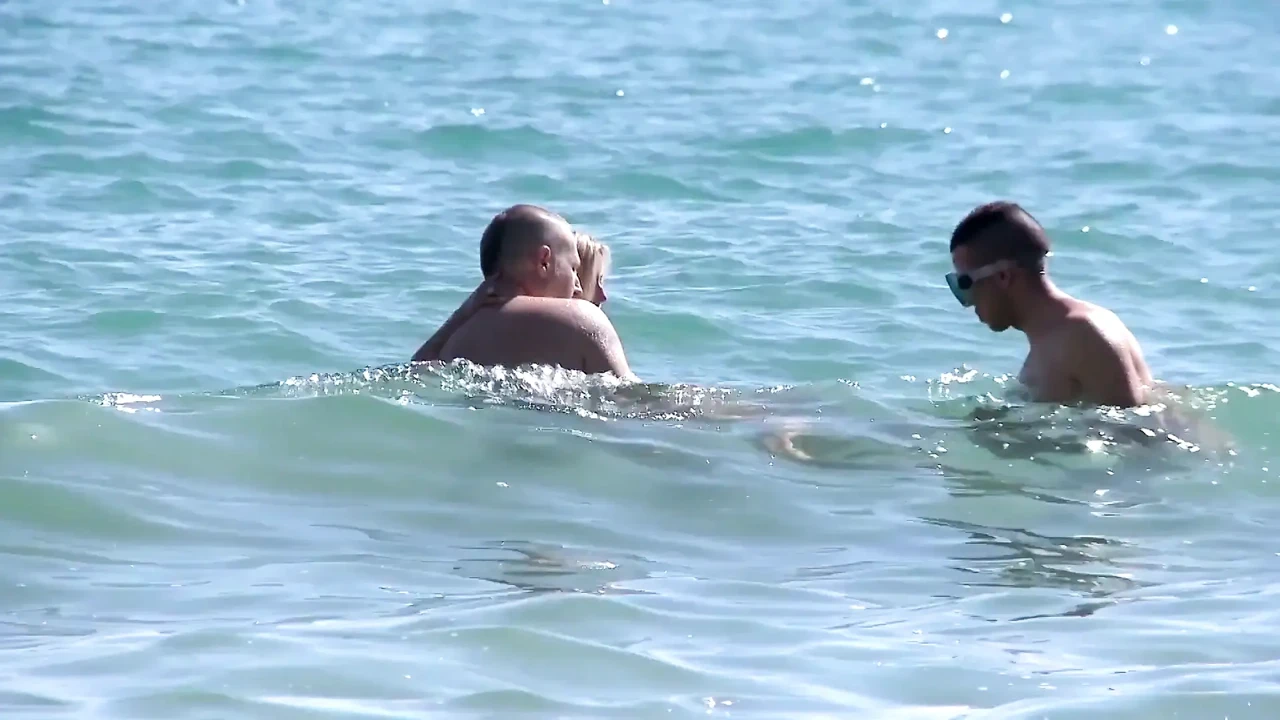 Outdoor DP fuck with blonde milf on the beach