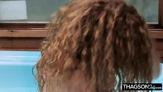 Curly-haired Babe Masturbates with Bottle in Hot Tub