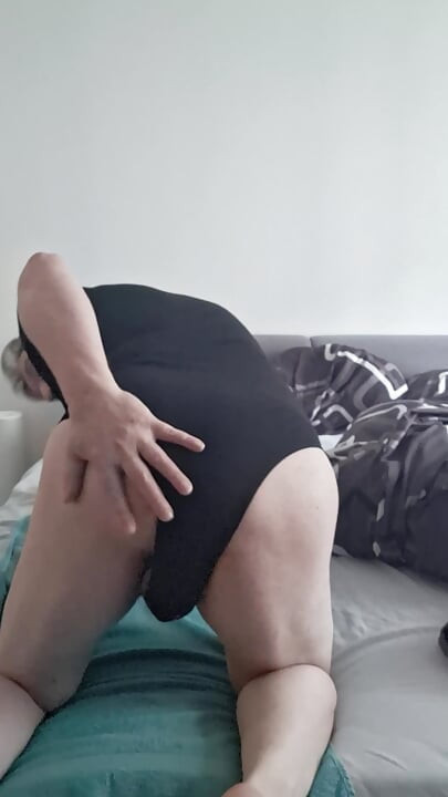 From behind