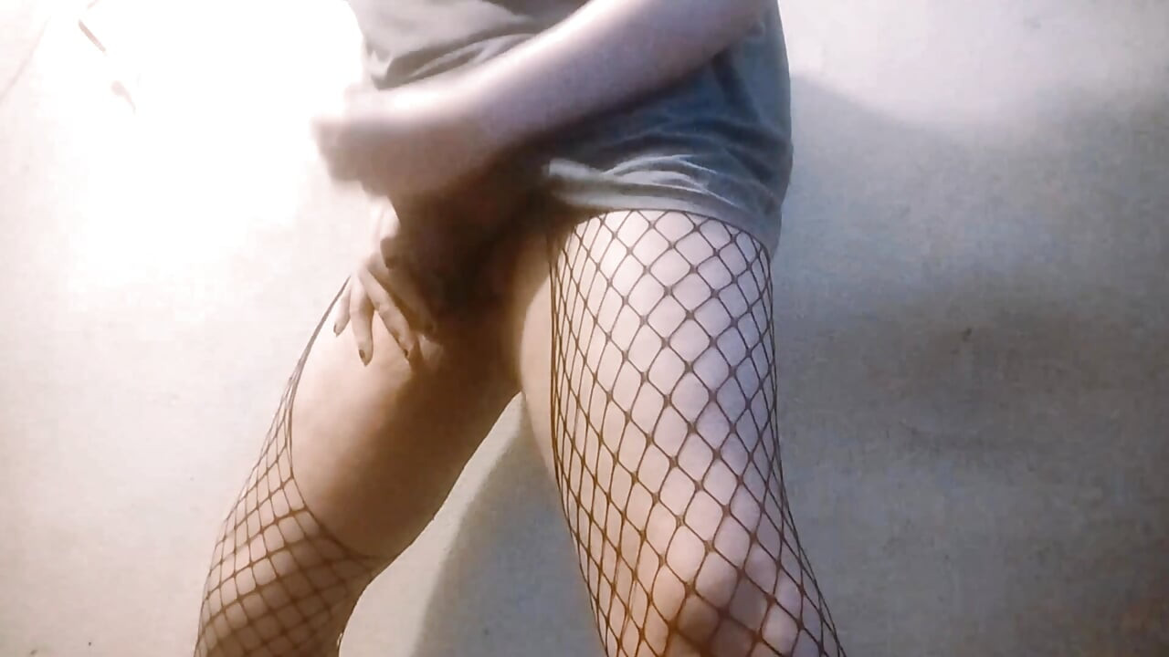 Femboy in Gothic Fishnet Stockings Strokes His Cute Chubby Transgirl Cock on Camera While Squeezing Fat Thighs in Pleasur