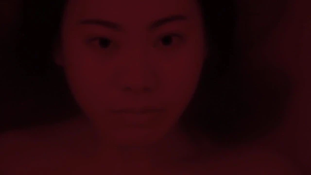 Asian lady underwater bathtub
