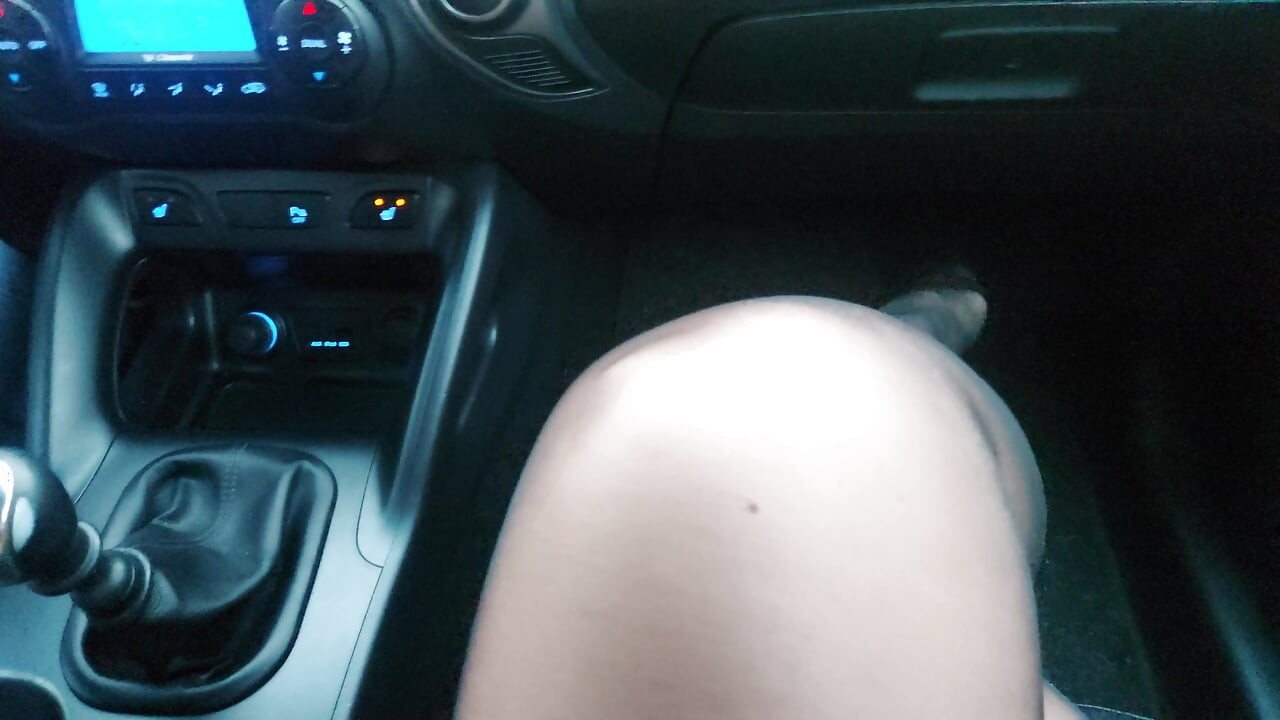 Horny milf in nylon stockings teases a taxi driver in the car, with her sexy legs and feet in the morning