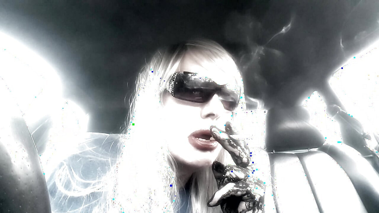 Mrs. Ruthie Dommie Mommy smoking Marlboro 100s in her car