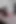 Pvc etekli ve külotlu çoraplı seksi kızıl saçlı poz