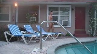 Jerking naked by the hotel pool