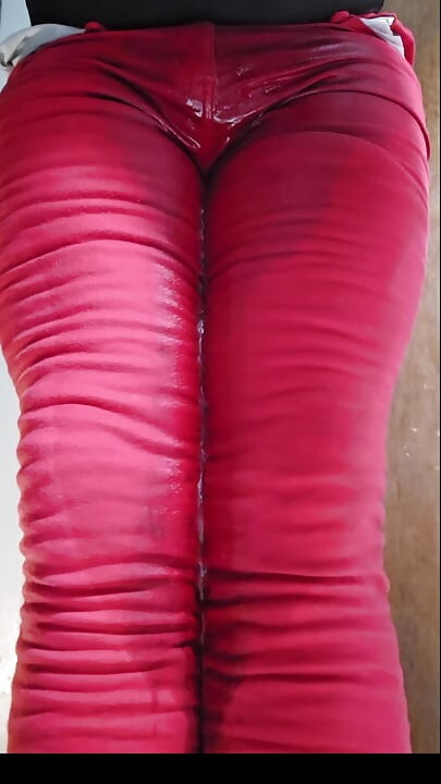 Satisfying soaking of red skinny jeans