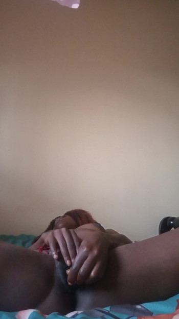 Key moment from "Candy27 fucking her self with sex toy while wearing waite waisted bead."