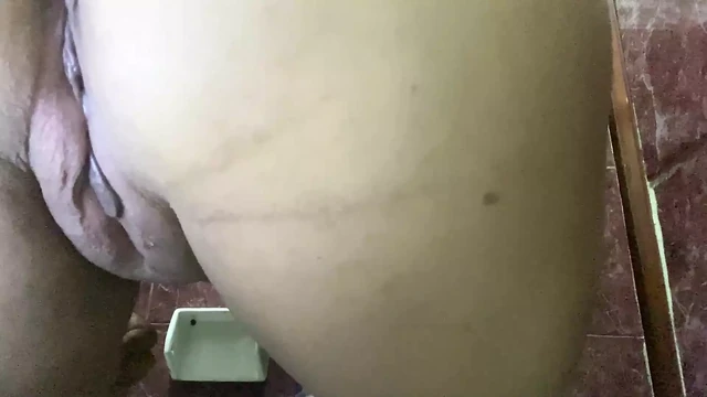 SECRETARY TRAPPED IN THE BATHROOM PISSING
