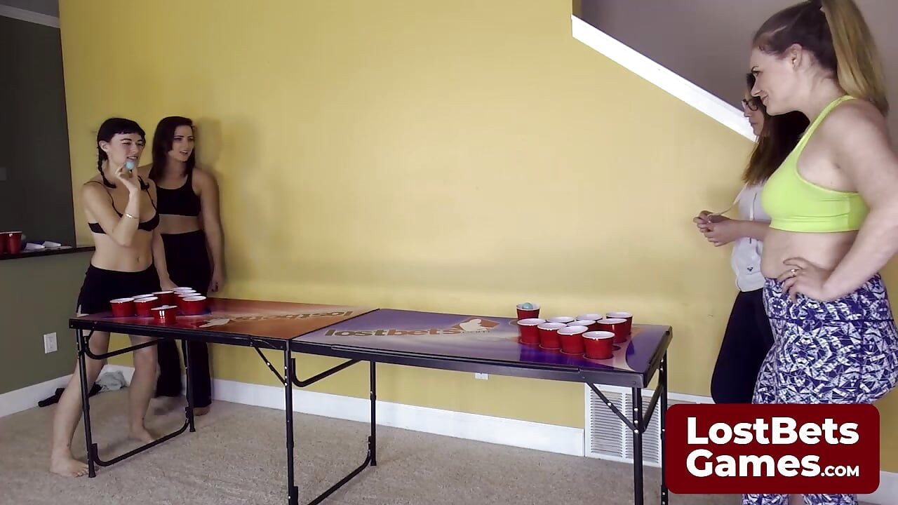 The Strip Air Pong losers eagerly please the winners