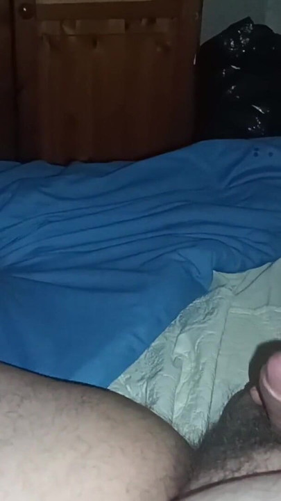 Key moment from "Chubby man masturbating his small dick in bed"