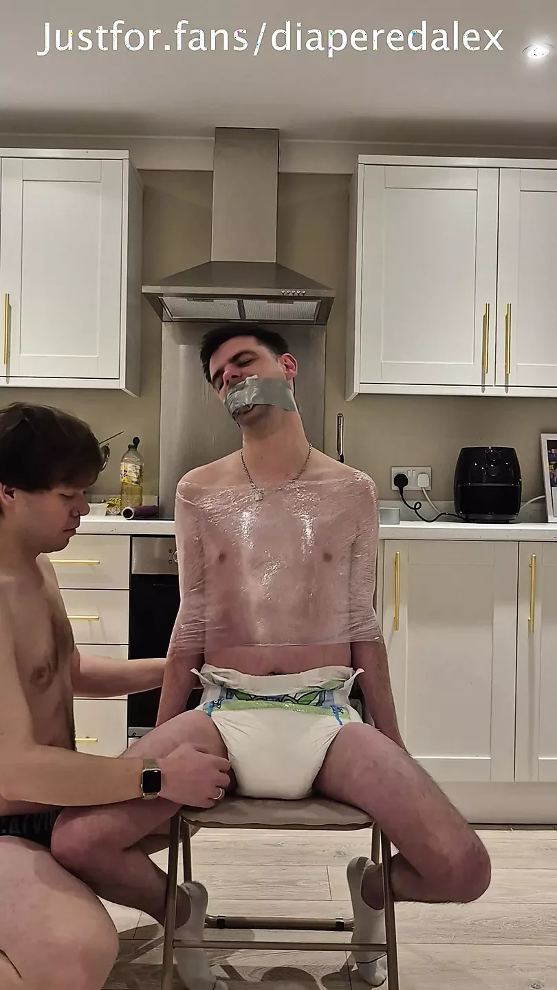 Diaper Boy Tied to a Chair
