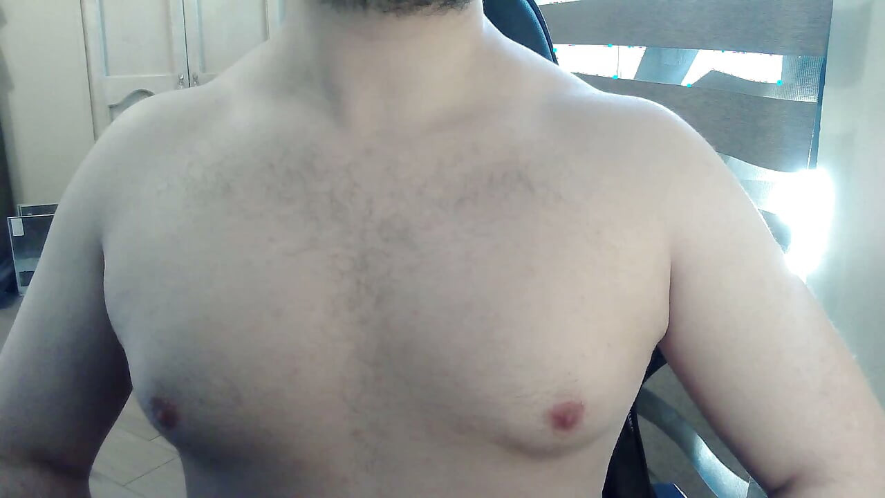 Muscular stud plays with his nipples and muscles